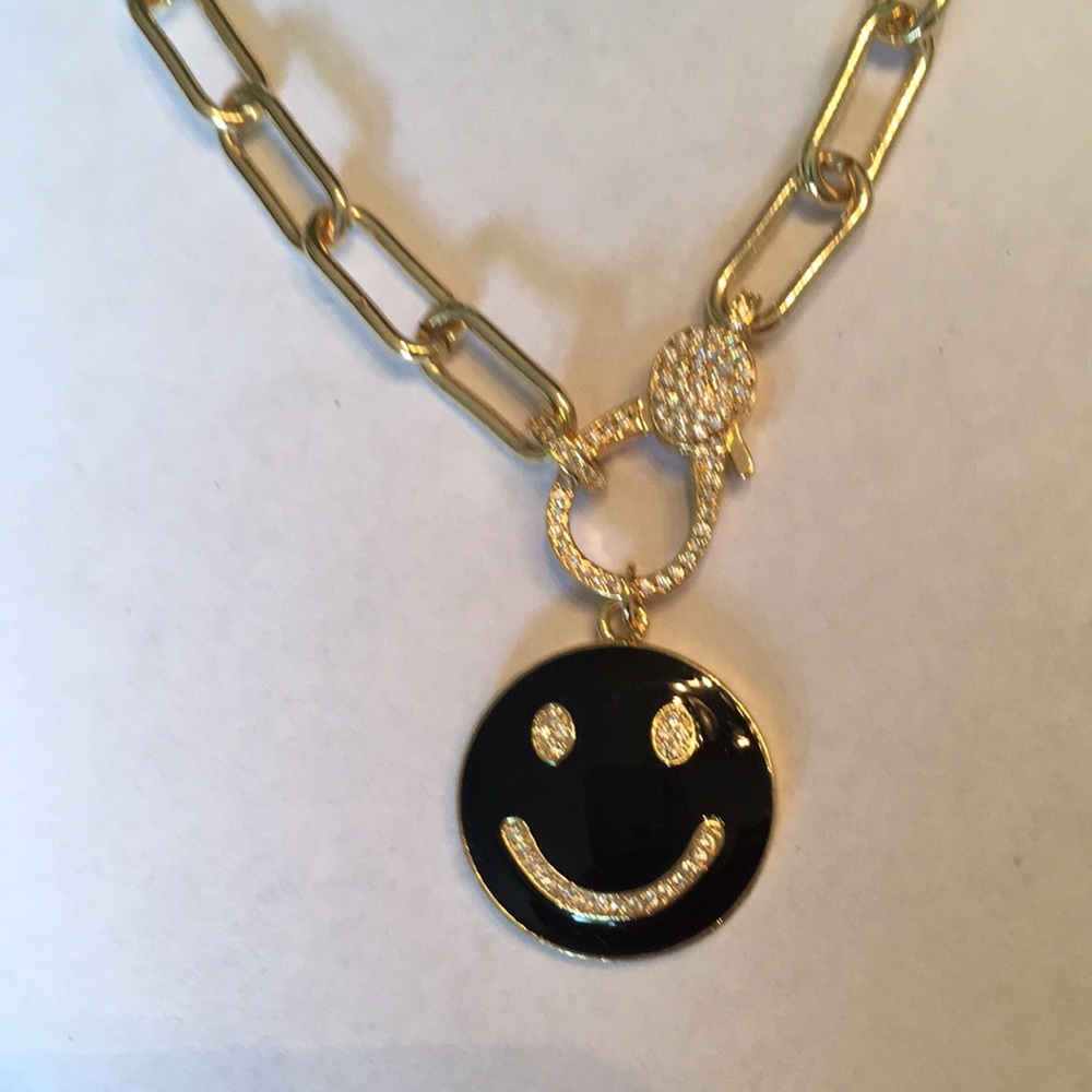 Gold necklace with CZ clasp & black smiley charm